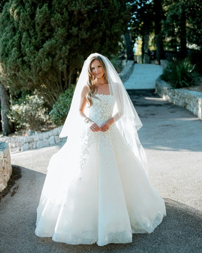 hannah brown blue dress Brown's Fairytale Wedding in the Cheyan Gown by Mira Zwillinger neck bishop sleeve dress